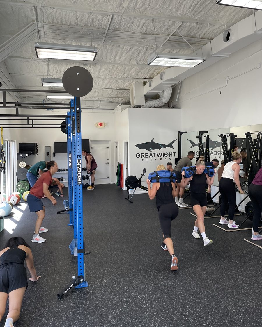 A coached small group session on the Great Wight Fitness floor